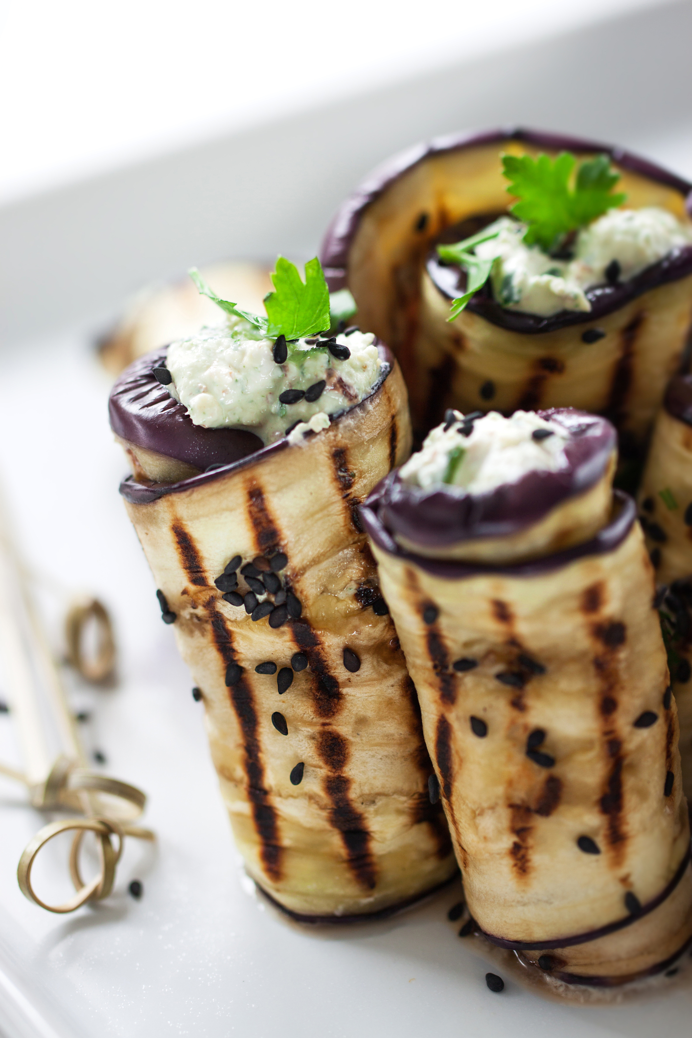 Stuffed eggplant rolls with cottage cheese and walnuts